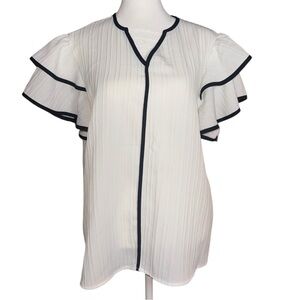 5️⃣Elegant White Ruffle Sleeve Top